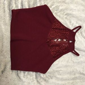 Red/maroon halter crop top.